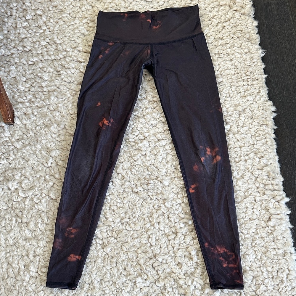Teeki black leggings with longhorn skulls on back of thighs. Used good condition